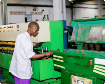 Nigerchin technicians working with machines in the factory - Nigerchin is the Leading Cables and Wire Manufacturer in Nigeria